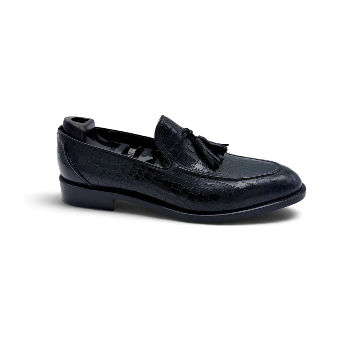 Mocassin Roberto Celk à pompon en cuir de crocodile noir